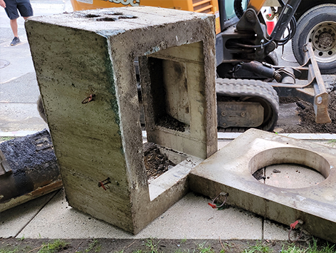 <b>Relocation of HEX manhole C19BA-203:</b>  Removed old 2'x3'x2'D vault