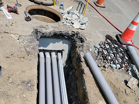 New (11) 4 inch ducts and (4) 1.25 inch ducts are mated onto existing HEX manhole C19BA-202.  This is the project interface at which C19BA Tranche 4-1 section begins.