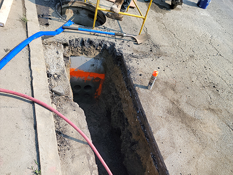 Beginning of the mainline section trench from HEX manhole C19BA-203.