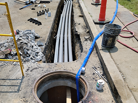 View of the newly mated Tranche 4-1 mainline duct bank from manhole C19BA-203.