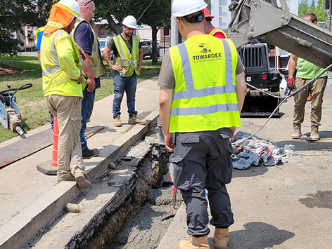 Inspection of the concrete pour against the wooden formwork emplaced to restore the south wall of manhole C19BA-203